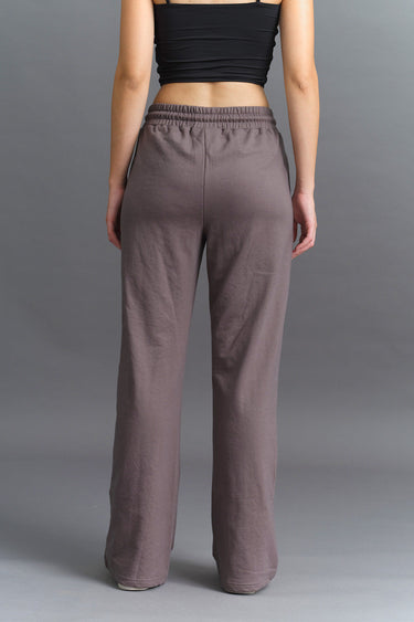 Dark Shadow wide-leg sweatpants by Bonkers Corner, featuring a relaxed fit and casual style, shown on a model.