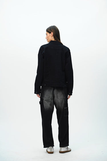 Bonkers Corner denim jacket in light wash with classic collar and button closure, styled on a hanger.