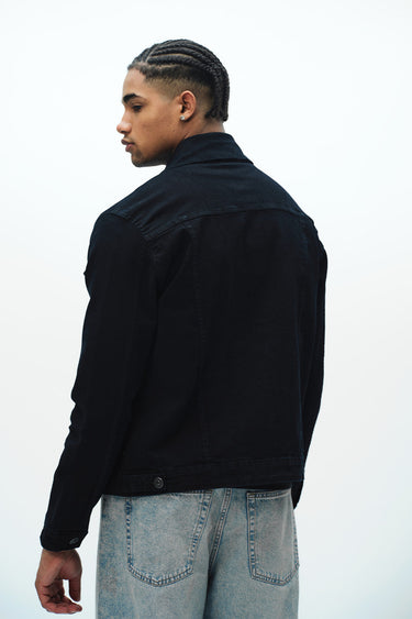 Bonkers Corner denim jacket in light wash with classic button-front design, casual style, and chest pockets.
