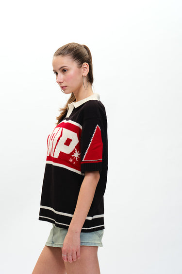 Bonkers Corner drip knit polo shirt in XS with a close-up of the textured fabric and classic collar design.
