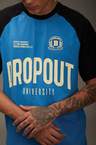 Bonkers Corner Dropout University oversized T-shirt in white, featuring a bold university logo on the front.