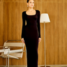 Bonkers Corner Eclipse Black Maxi Dress displayed on a model, featuring flowy fabric and a stylish, elegant design.