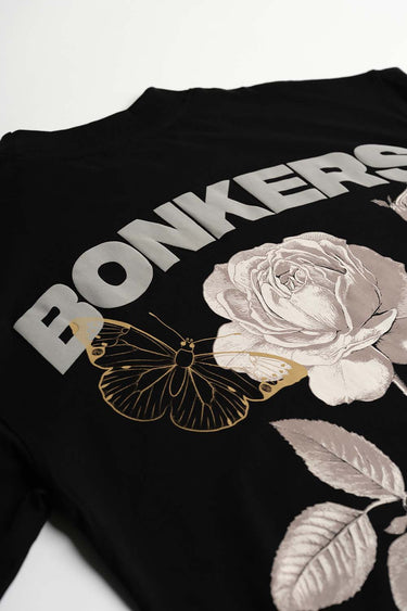 Bonkers Corner Embrace Your Inner Rose oversized T-shirt in XS, featuring a floral rose design on soft fabric.