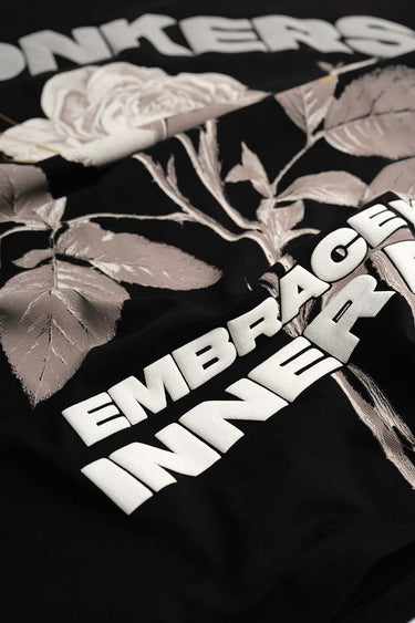 Bonkers Corner Embrace Your Inner Rose premium oversized T-shirt featuring a floral rose design on soft fabric.