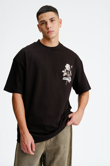 Bonkers Corner oversized T-shirt featuring a floral rose design and relaxed fit, perfect for casual wear.