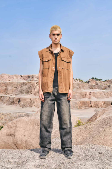 Bonkers Corner faded grey baggy fit jeans displayed on a model, showcasing relaxed style and casual denim design.