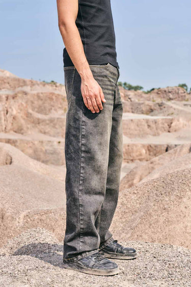 Faded grey baggy fit jeans by Bonkers Corner, displayed on a white background, showcasing relaxed denim style and fit.