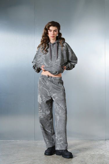Faded grey Bonkers Corner hoodie with a relaxed fit, featuring soft fabric and a casual style, shown on a hanger.