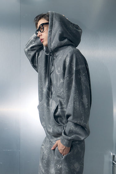 Faded grey hoodie from Bonkers Corner with a relaxed fit, featuring a soft fabric and casual style, shown on a hanger.