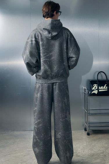 Faded grey Bonkers Corner hoodie with a relaxed fit and soft fabric, shown on a hanger against a plain background.