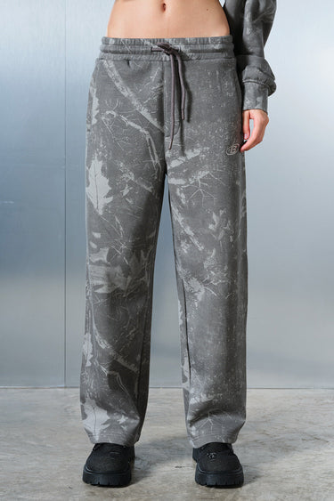 Bonkers Corner faded grey joggers, casual athletic pants with a relaxed fit, shown on a model.