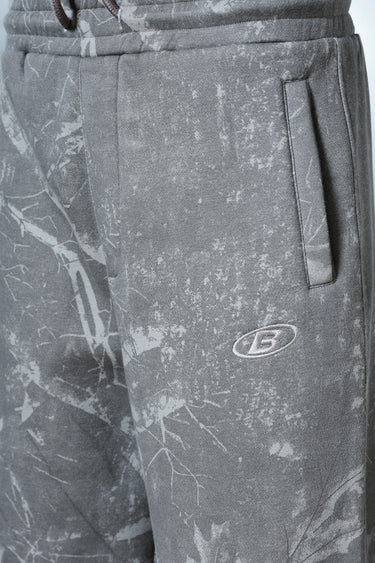 Faded grey Bonkers Corner joggers with elastic waistband and cuffs, casual fit, suitable for active and relaxed wear.