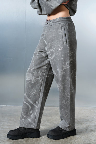 Faded grey Bonkers Corner joggers displayed on a model, showcasing comfortable casual fit and soft fabric.
