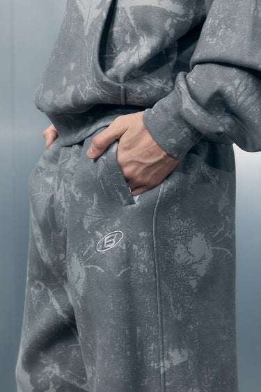 Bonkers Corner faded grey joggers made of soft fabric, featuring a relaxed fit and elastic waistband for comfortable casual wear.