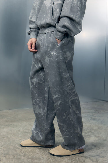 Faded grey Bonkers Corner joggers with elastic waistband and cuffs, casual fit, made from soft fabric.