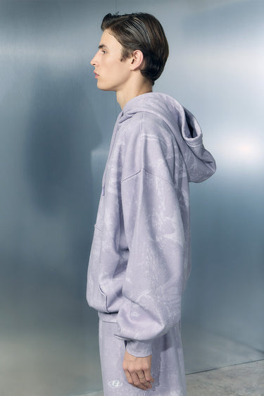 Faded lavender hoodie by Bonkers Corner featuring a relaxed fit and soft fabric, displayed on a hanger.