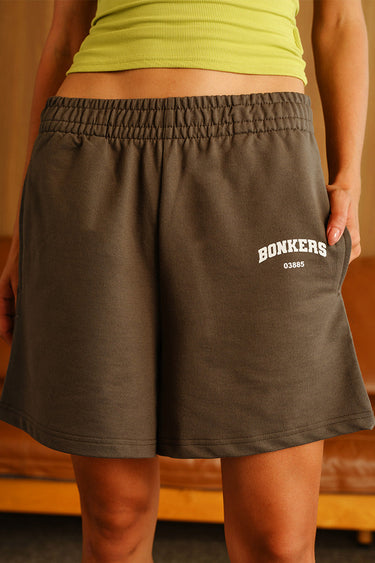 Bonkers Corner Fog Olive Lounge Shorts in XS, soft fabric with a relaxed fit, displayed on a neutral background.