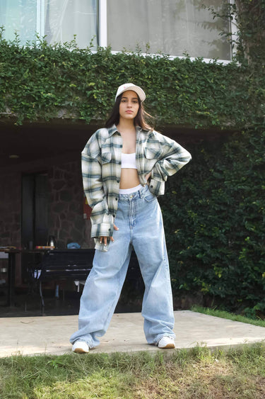 Green plaid flannel oversized shirt by Bonkers Corner, shown in a relaxed fit with button-up front and classic collar.