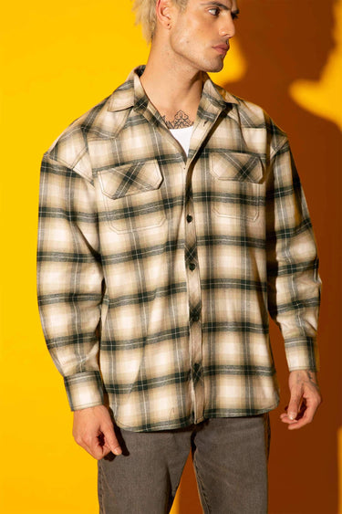 Green plaid flannel oversized shirt by Bonkers Corner, featuring a relaxed fit and classic checkered pattern.