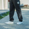 Grey cargo pants with utility pockets from Bonkers Corner, featuring a relaxed fit and functional pocket design.