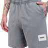 Grey heavyweight faded shorts from Bonkers Corner with a relaxed fit and casual style, shown on a model.