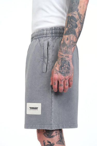 Grey heavyweight faded shorts by Bonkers Corner, featuring a relaxed fit and casual style, shown laid flat with a soft fabric texture.