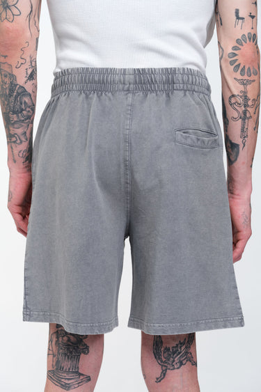 Grey heavyweight faded shorts by Bonkers Corner, showing a relaxed fit and distressed fabric details.