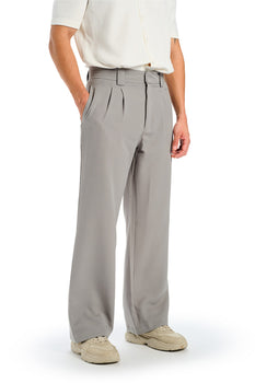 Grey loose fit tailored trousers by Bonkers Corner, shown in a relaxed style with a comfortable, modern fit.