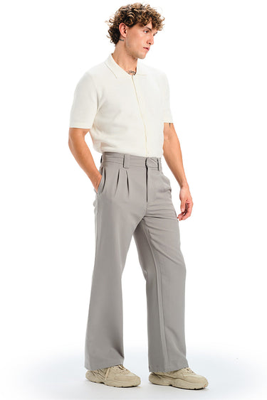 Grey loose fit tailored trousers by Bonkers Corner, showcasing a relaxed yet structured fit with a smooth fabric finish.