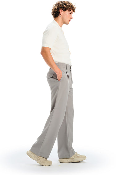Grey loose fit tailored trousers by Bonkers Corner, shown on a model with a relaxed, comfortable fit and tailored design.