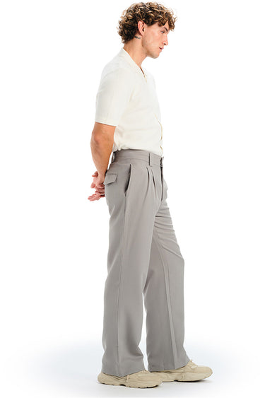 Grey loose fit tailored trousers from Bonkers Corner, showing the relaxed fit and sleek design on a mannequin.