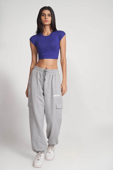 Grey melange cargo pants by Bonkers Corner, showing relaxed fit and multiple pockets, made from comfortable fabric.