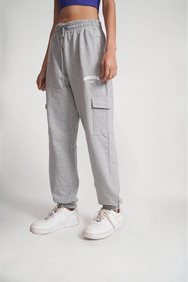Grey melange cargo pants by Bonkers Corner, showing relaxed fit and multiple pockets on lightweight fabric.