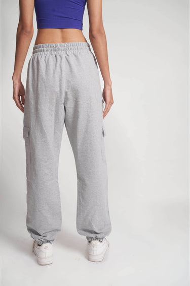 Grey melange cargo pants by Bonkers Corner, featuring multiple pockets and a relaxed fit, displayed on a neutral background.