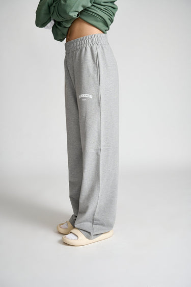 Grey melange wide-leg pants by Bonkers Corner, featuring a relaxed fit and soft fabric, shown on a model.