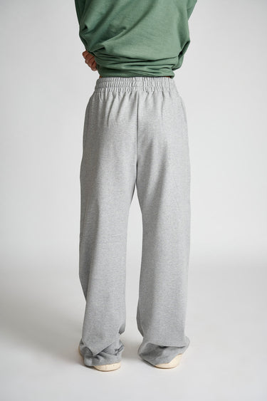 Grey Melange Wide-Leg pants by Bonkers Corner, showing a relaxed fit with wide legs and soft fabric texture.