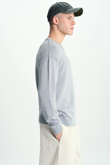 Grey Bonkers Corner Mode crewneck sweatshirt displayed on a hanger, showcasing a casual, comfortable fit and soft fabric.