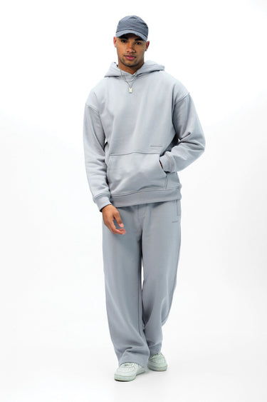 Grey Wear A Hug oversized hoodie by Bonkers Corner, showing a cozy, oversized hoodie with a relaxed fit and front pocket.