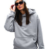 Grey Wear A Hug oversized hoodie by Bonkers Corner, showing soft fabric and relaxed fit with a front pocket and hood.