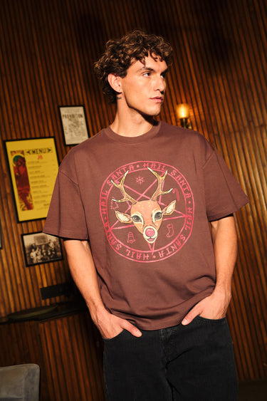 Bonkers Corner Hail Santa oversized T-shirt featuring festive Santa graphic and bold holiday design in white and red.