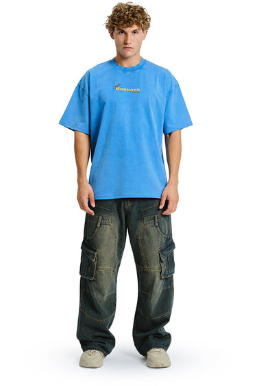 Bonkers Corner Homeboys faded blue oversized T-shirt displayed on a hanger, showcasing relaxed fit and casual style.