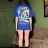Bonkers Corner I'm Out oversized T-shirt in white, featuring bold graphic text on front, casual fit, and soft cotton fabric.