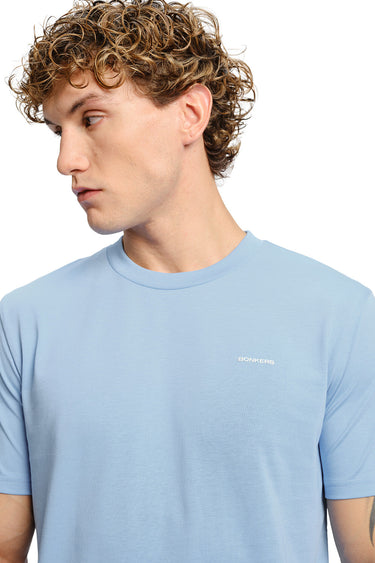 Bonkers Corner Iceberg Blue Supima regular fit T-shirt displayed on a model, featuring a classic crew neck and soft fabric.