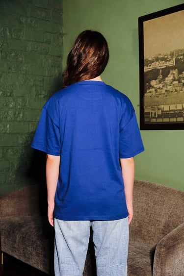 Blue oversized T-shirt from Bonkers Corner featuring a playful Imaginary Friends graphic on the front.