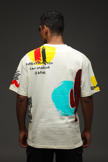 Light blue oversized T-shirt from Bonkers Corner with "Imagination Is Real" print, casual fit, and soft cotton fabric.