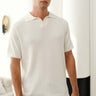 Ivory knit polo T-shirt by Bonkers Corner, close-up of soft textured fabric and classic collar detail.