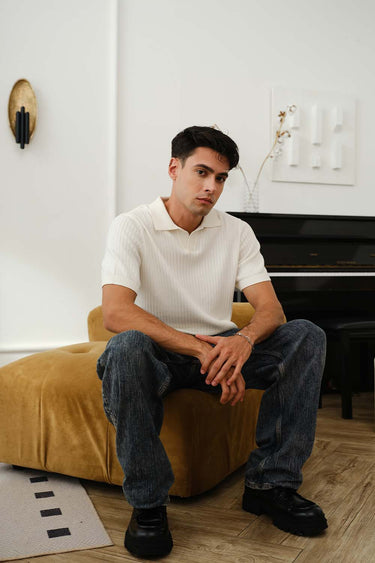 Ivory knit polo T-shirt by Bonkers Corner featuring a classic collar and short sleeves, displayed on a plain background.