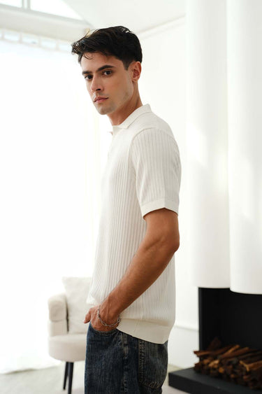 Ivory knit polo T-shirt by Bonkers Corner, close-up of textured fabric and classic collar on a casual men's shirt.