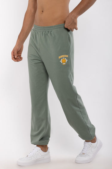 Bonkers Corner Jade Joggers in XS, soft green fabric with a relaxed fit and elastic waistband, displayed on a neutral background.