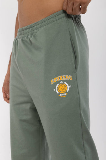 Bonkers Corner Jade Joggers in XS, soft green fabric with elastic waistband and relaxed fit, perfect for casual wear.